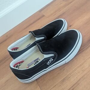 Vans Women's Black and White Slip-On Sneakers